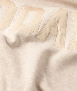 statement sweater logo